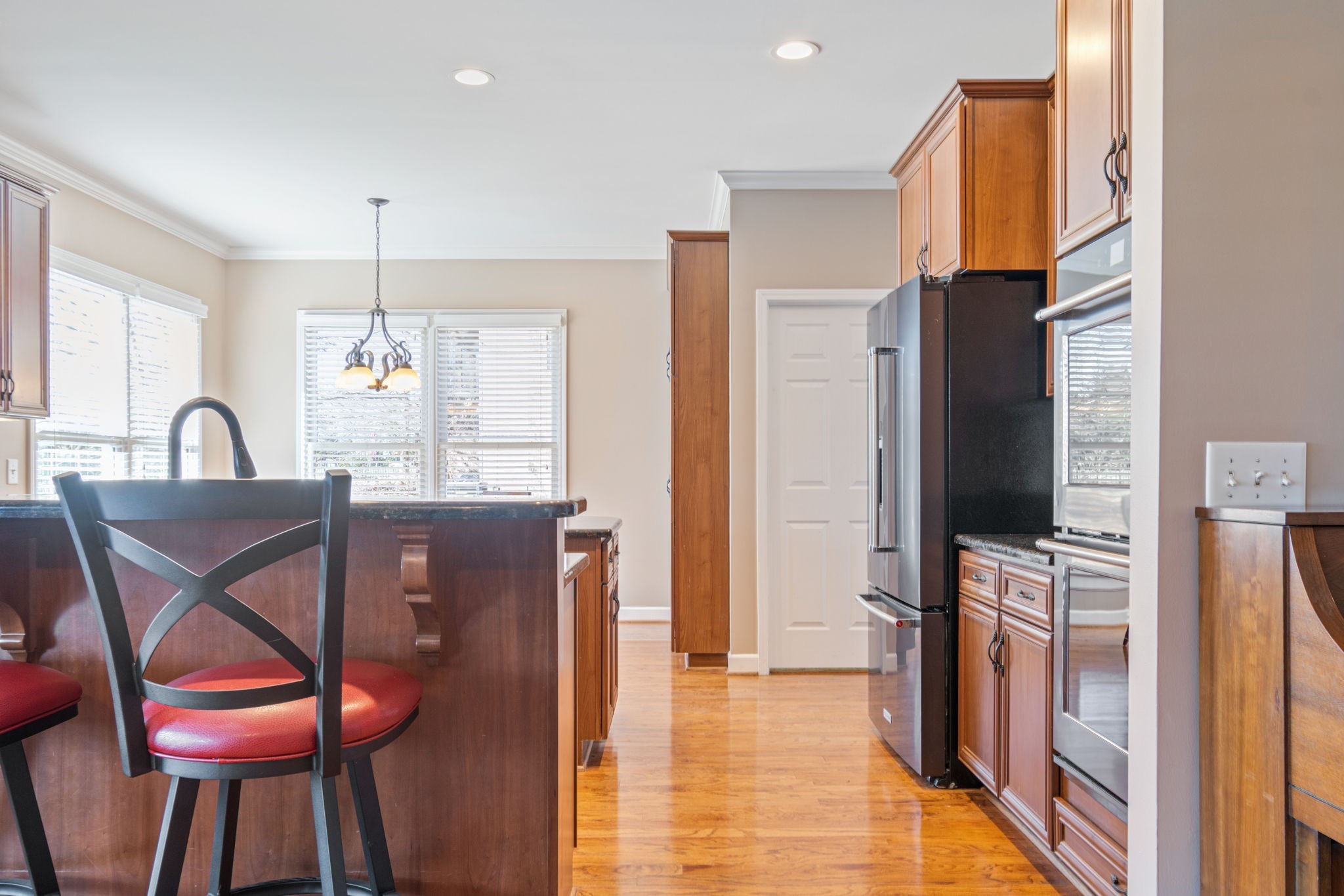 3517 Union Village Road Thompson's Station, TN 37179 - Photo 24 of 94 a kitchen with stainless steel appliances granite countertop a refrigerator and a stove top oven