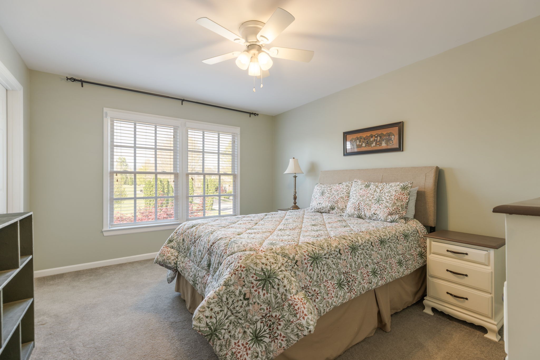 3517 Union Village Road Thompson's Station, TN 37179 - Photo 50 of 94 a bedroom with a bed and a chandelier