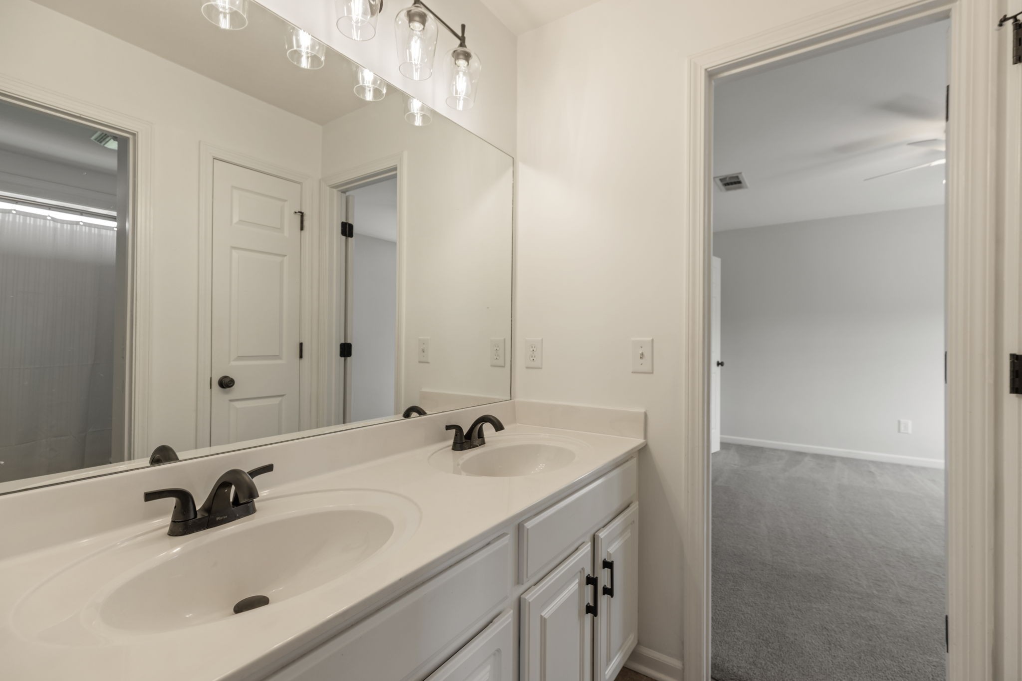 3517 Union Village Road Thompson's Station, TN 37179 - Photo 57 of 94 a bathroom with a sink and a mirror