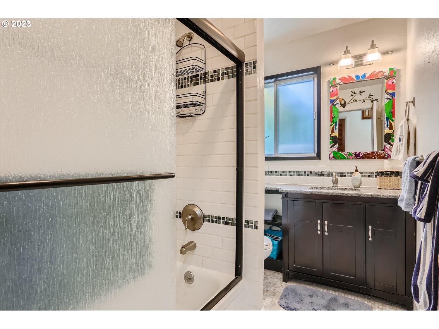 8220 Southwest Taylors Ferry Road Tigard, OR 97223 - Photo 22 of 38 a bathroom with a sink and a mirror