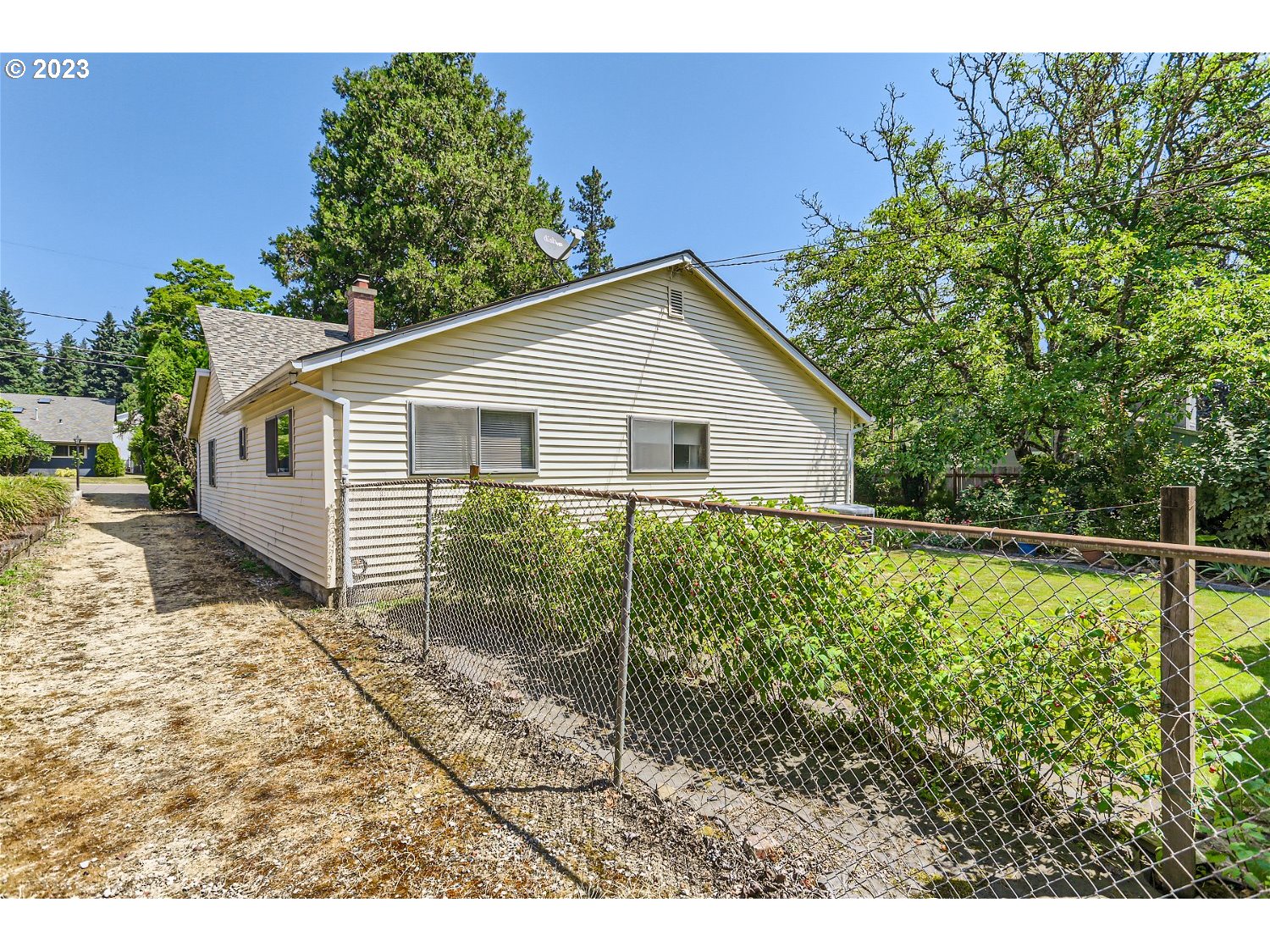 8220 Southwest Taylors Ferry Road Tigard, OR 97223 - Photo 29 of 38 a house view with a backyard space