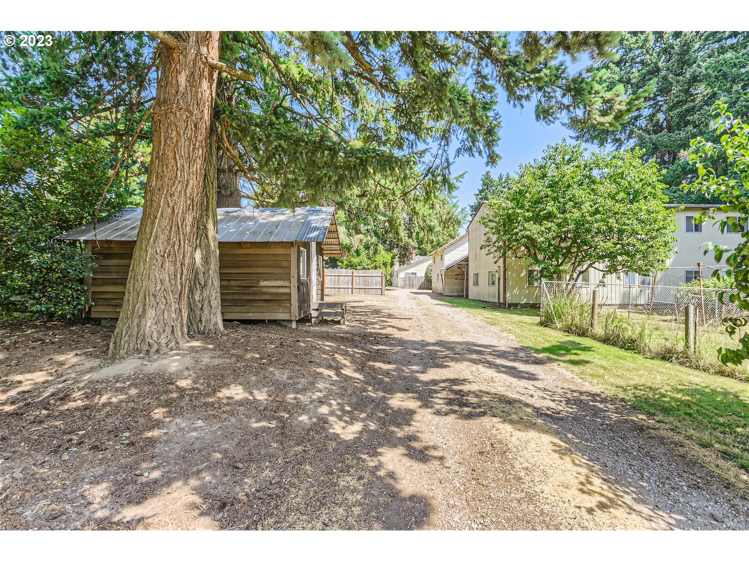 8220 Southwest Taylors Ferry Road Tigard, OR 97223 - Photo 32 of 38 a front view of a house with a yard