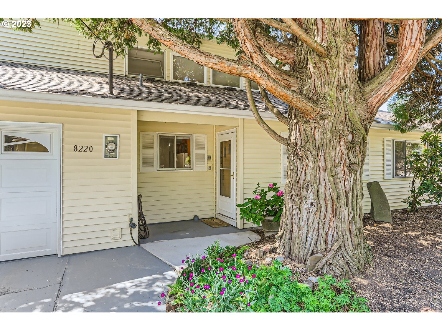 8220 Southwest Taylors Ferry Road Tigard, OR 97223 - Photo 4 of 38 a view of a house with a yard