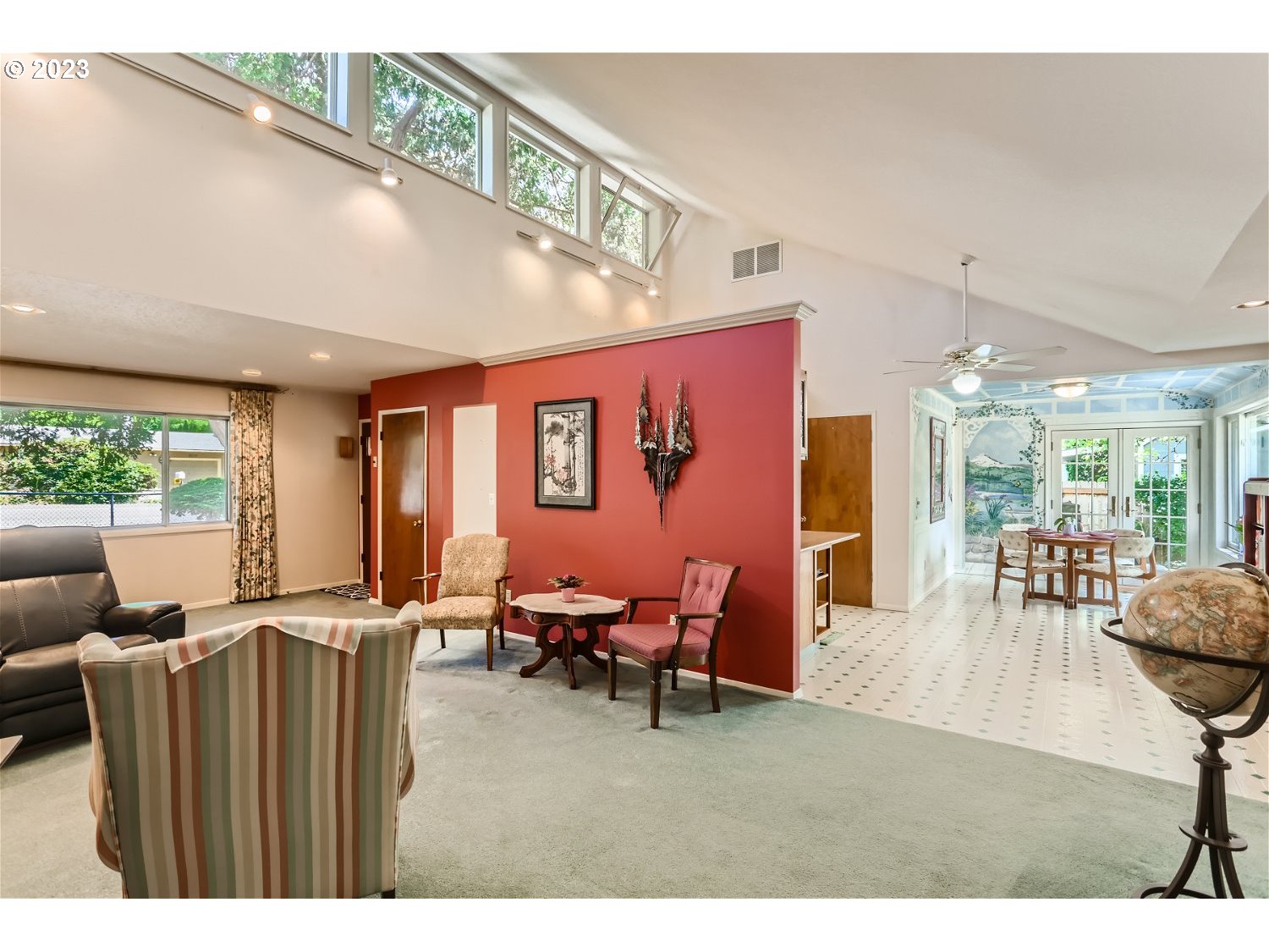 8220 Southwest Taylors Ferry Road Tigard, OR 97223 - Photo 7 of 38 a living room with furniture and a large window
