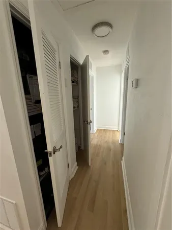 a room with furniture and wooden floor