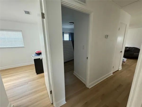 a living room with furniture fireplace and rug