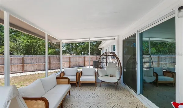 a view of a back yard of the house