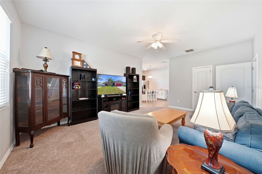14604 Rannoch Moor Place Wimauma, FL 33598 - Photo 25 of 76 a view of a dining room with furniture