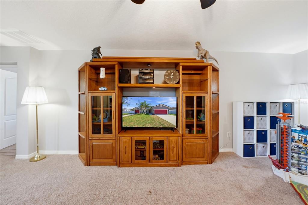 14604 Rannoch Moor Place Wimauma, FL 33598 - Photo 35 of 76 a front view of a house with large windows