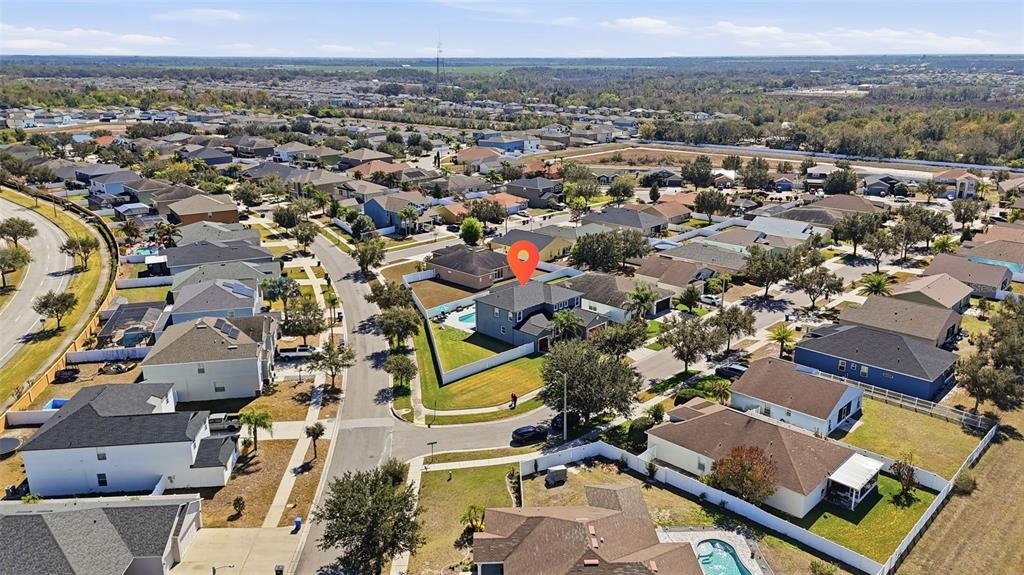 14604 Rannoch Moor Place Wimauma, FL 33598 - Photo 71 of 76 an aerial view of residential houses with outdoor space