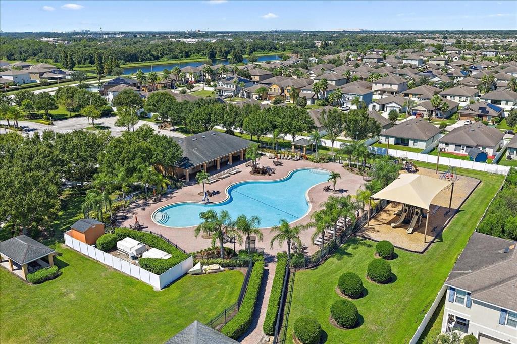 14604 Rannoch Moor Place Wimauma, FL 33598 - Photo 73 of 76 an aerial view of a pool patio and a yard