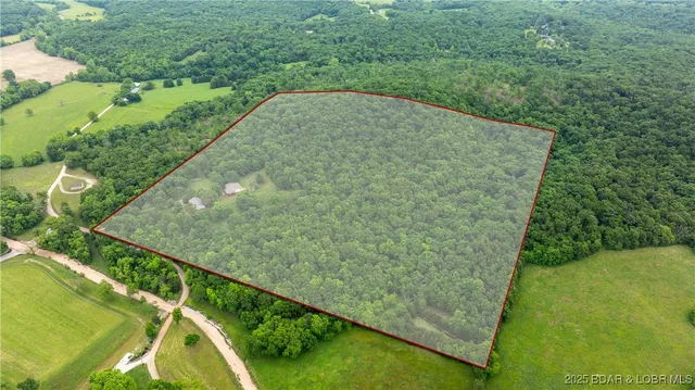 $595,000 | 660 Upper Prairie Hollow Road, Macks Creek, MO 65786