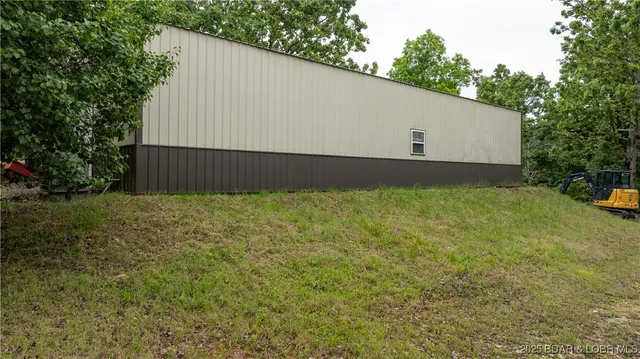 $595,000 | 660 Upper Prairie Hollow Road, Macks Creek, MO 65786