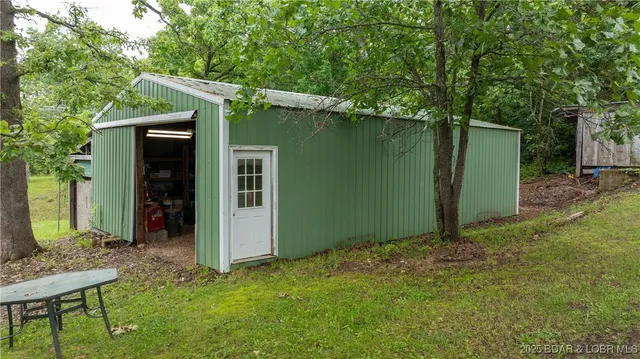 $595,000 | 660 Upper Prairie Hollow Road, Macks Creek, MO 65786