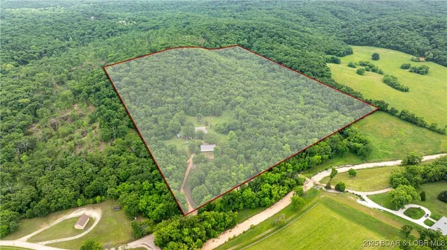 $595,000 | 660 Upper Prairie Hollow Road, Macks Creek, MO 65786