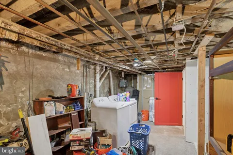 a picture of a bathroom with a shower