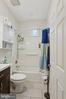 a room with furniture and a flat screen tv