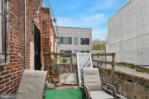 a view of a hallway and interior of a house