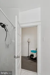 a view of a brick building with many windows