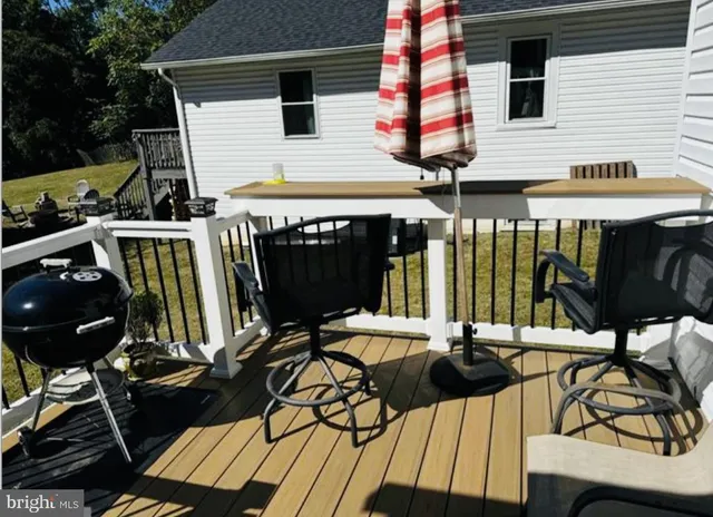 a view of swimming pool with seating space