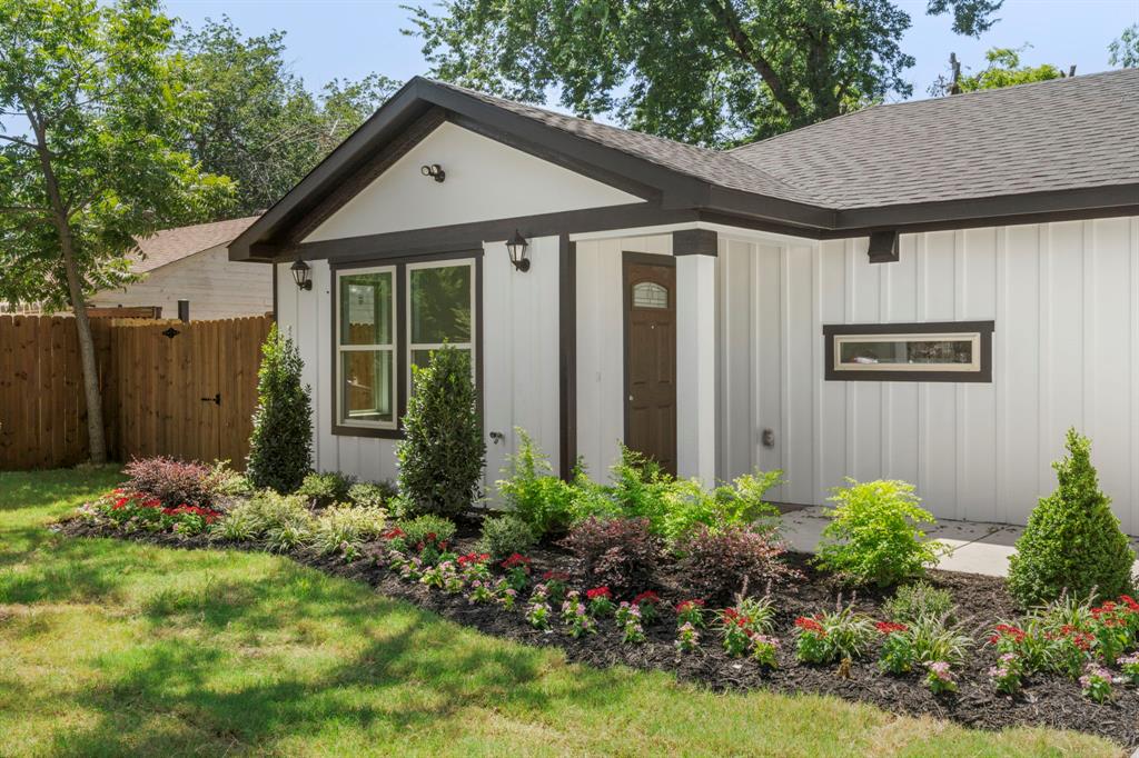 825 Apache Trace Grand Prairie, TX 75051 - Photo 2 of 30 a view of a house with garden