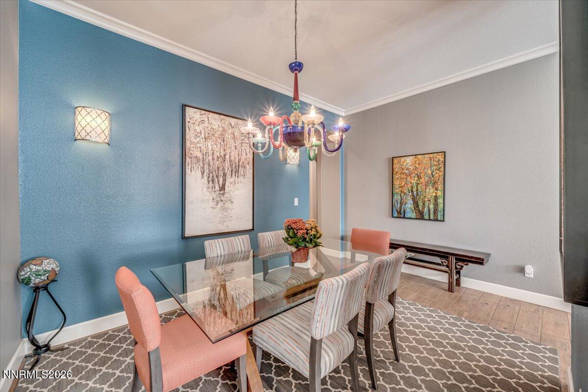 10562 Thistle Berry Court Reno, NV 89521 - Photo 15 of 44 a dining room with furniture and window