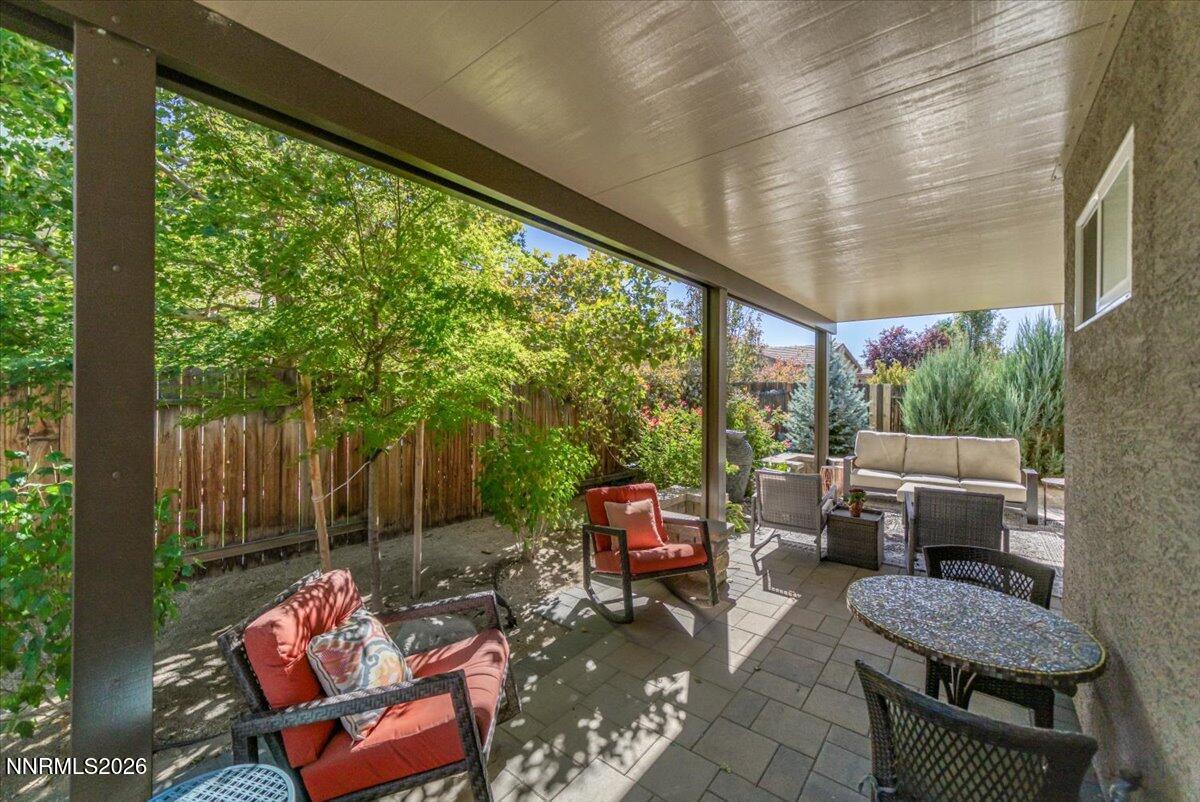 10562 Thistle Berry Court Reno, NV 89521 - Photo 39 of 44 a backyard of a house with outdoor seating