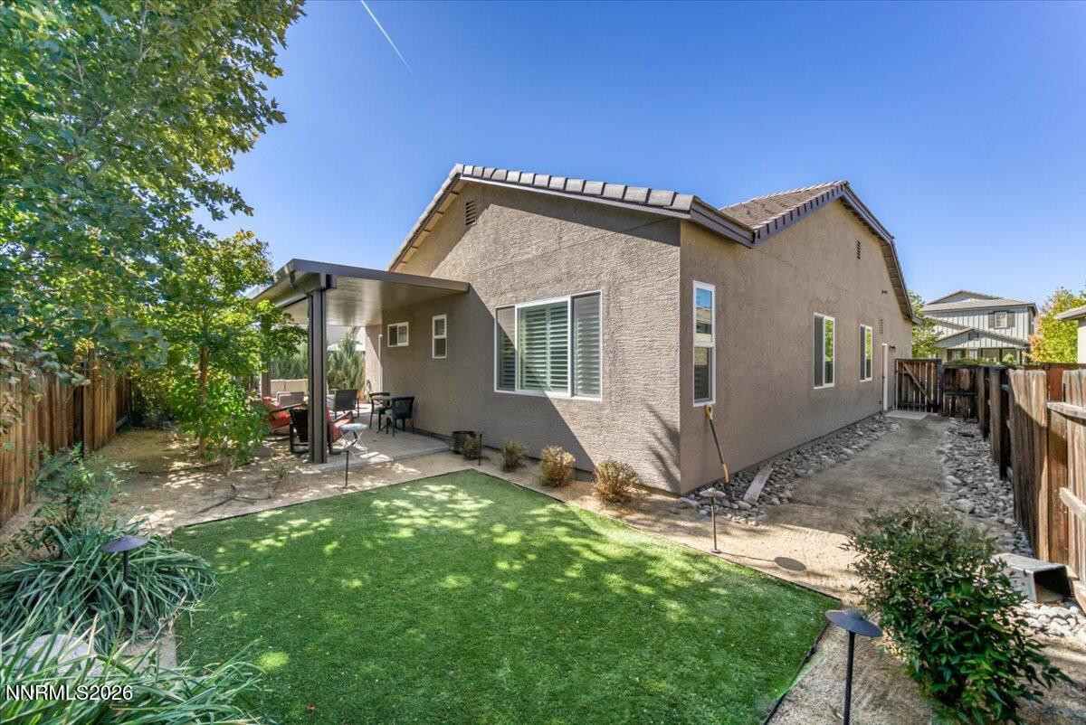 10562 Thistle Berry Court Reno, NV 89521 - Photo 41 of 44 a view of a house with backyard