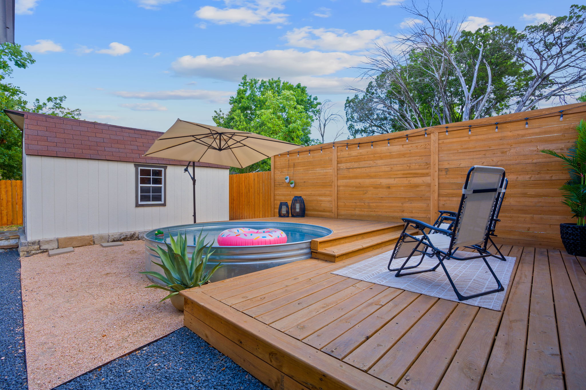 7110 Tawny Circle Austin, TX 78745 - Photo 30 of 30 Wooden deck featuring a swimming pool and a fenced backyard