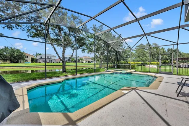 a view of a house with a big yard