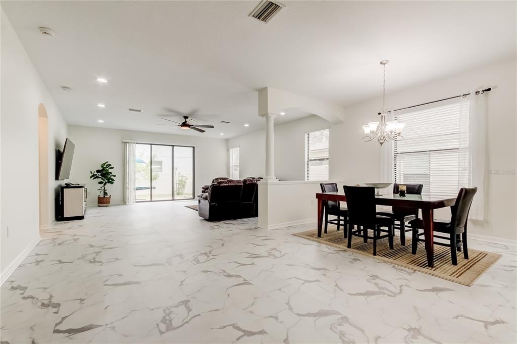 12747 Tikal Way Trinity, FL 34655 - Photo 20 of 40 a view of a dining room with furniture