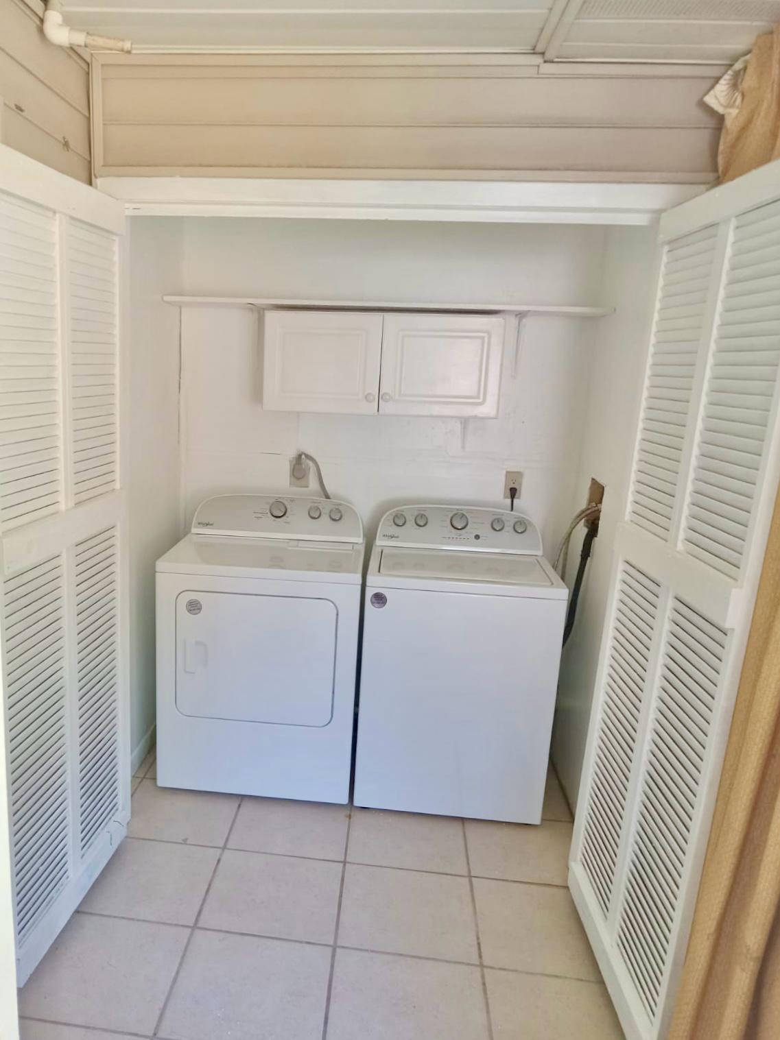 25 Blenheim Lane, Unit 4 Santa Rosa Beach, FL 32459 - Photo 12 of 13 a utility room with dryer and washer