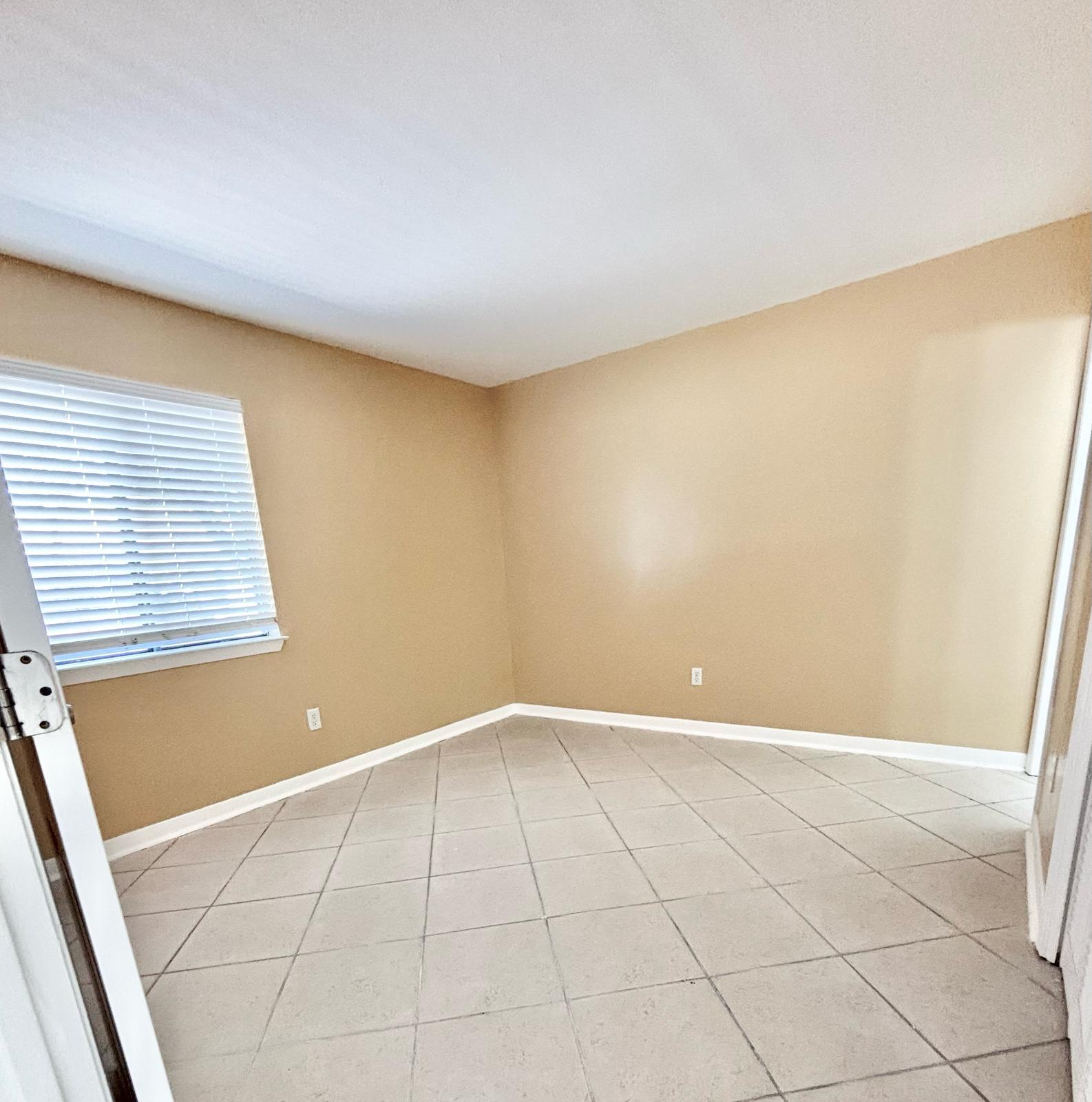 25 Blenheim Lane, Unit 4 Santa Rosa Beach, FL 32459 - Photo 7 of 13 a view of an empty room with a window