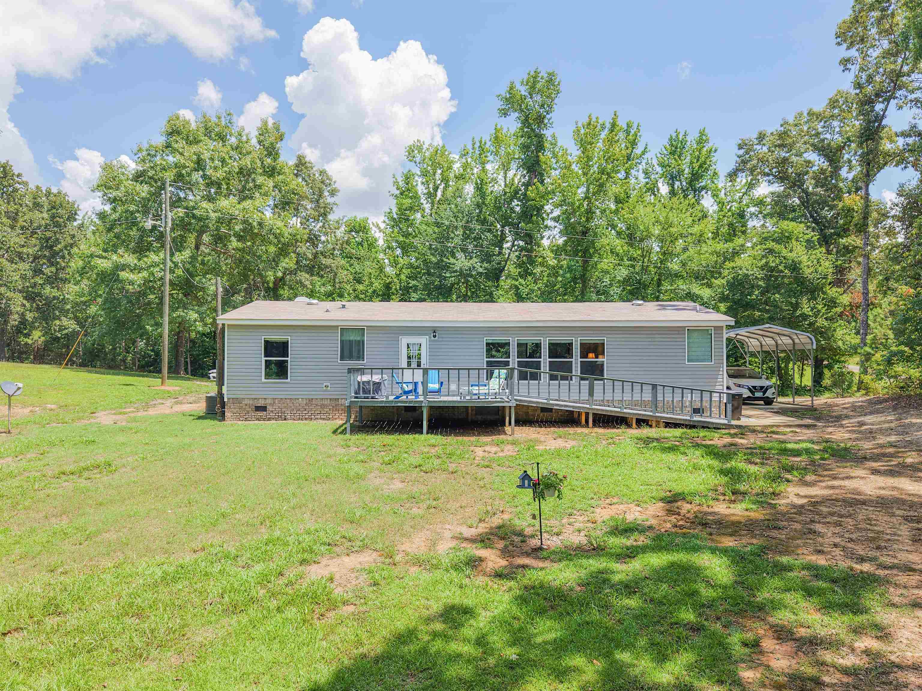 162 Matlock Road Ramer, TN 38367 - Photo 6 of 29 a view of a house with a yard