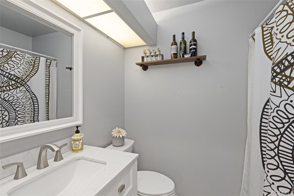 19 Brisa Ribera Rancho Santa Margarita, CA 92688 - Photo 11 of 16 front view of a house with a tree