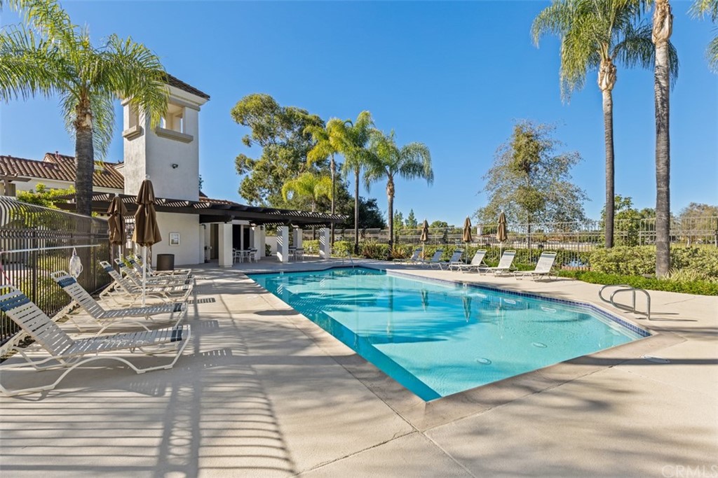 19 Brisa Ribera Rancho Santa Margarita, CA 92688 - Photo 13 of 16 a view of swimming pool with outdoor seating and yard