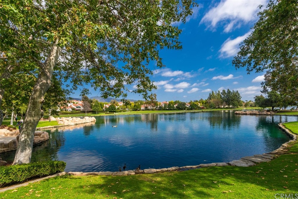 19 Brisa Ribera Rancho Santa Margarita, CA 92688 - Photo 15 of 16 a view of a lake from a yard