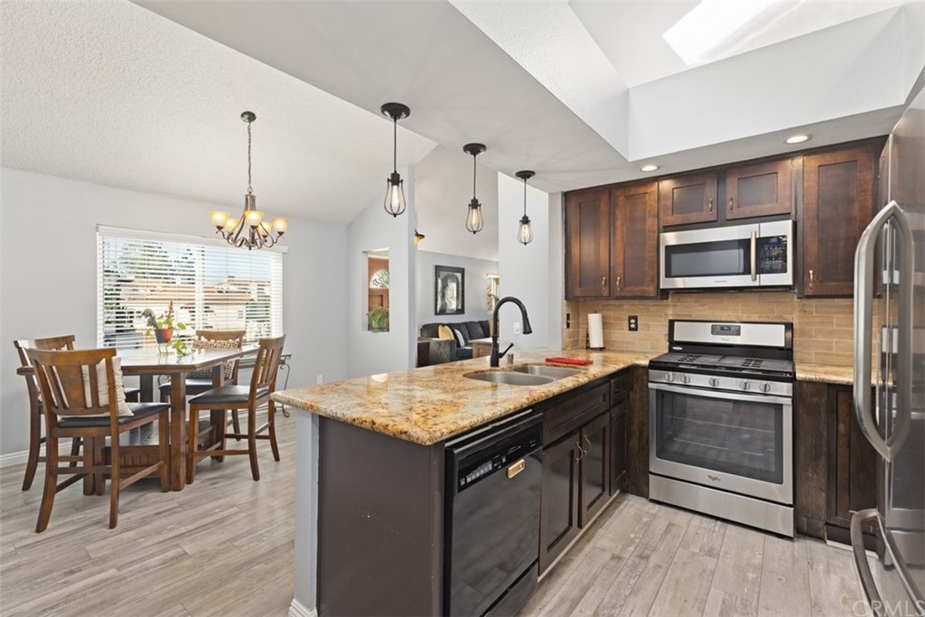 19 Brisa Ribera Rancho Santa Margarita, CA 92688 - Photo 7 of 16 a view of a livingroom with furniture and windows