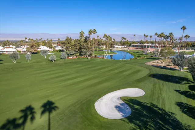 a view of a large building with a ocean view