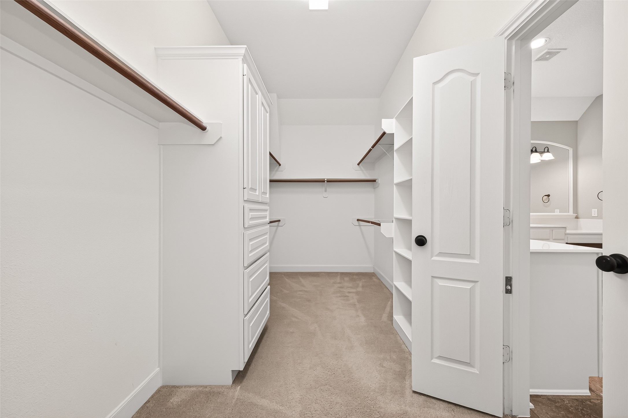 2310 Spring Lake Park Lane Spring, TX 77386 - Photo 42 of 47 a view of walk in closet with white walls