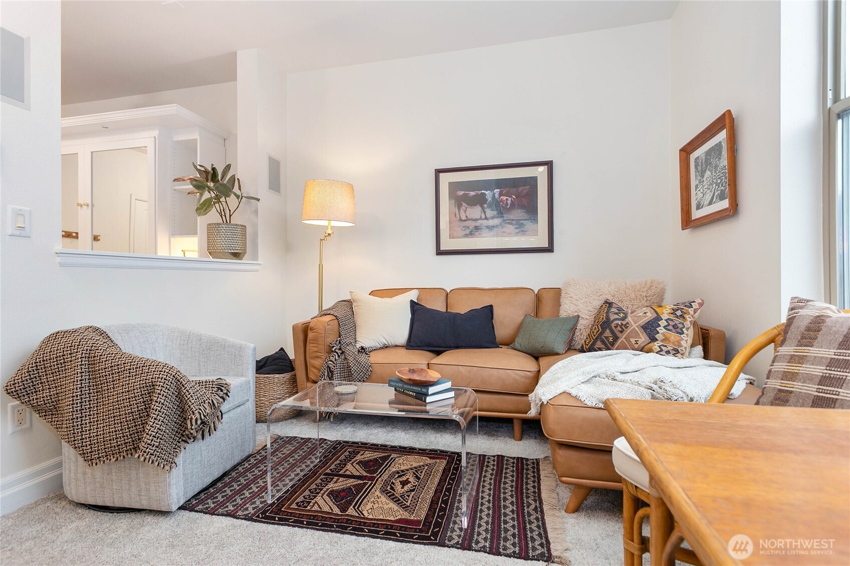 1310 10th Street, Unit 408 Bellingham, WA 98225 - Photo 11 of 33 a living room with furniture and a rug