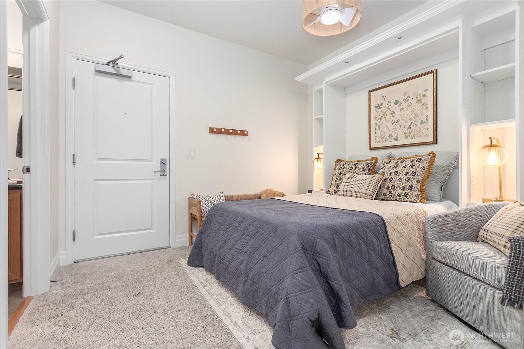 1310 10th Street, Unit 408 Bellingham, WA 98225 - Photo 19 of 33 a bedroom with a bed and a couch