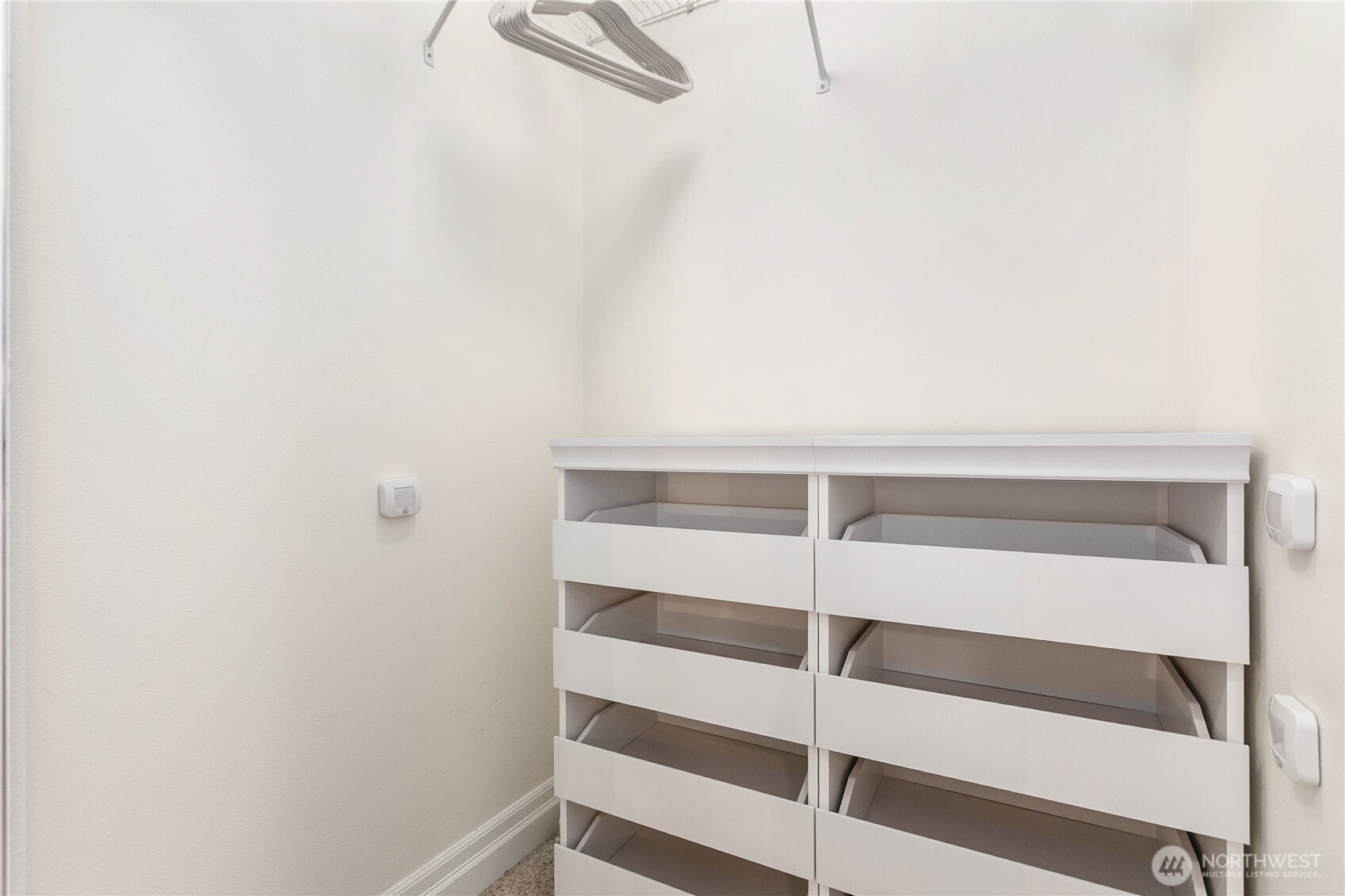 1310 10th Street, Unit 408 Bellingham, WA 98225 - Photo 22 of 33 a view of a room with rack on the wall