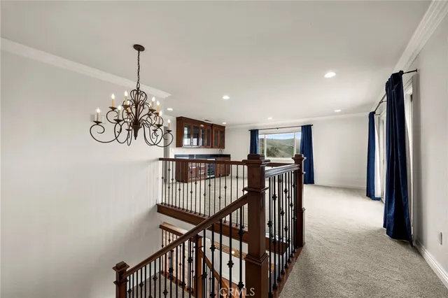 a bathroom with a sink mirror and a shower