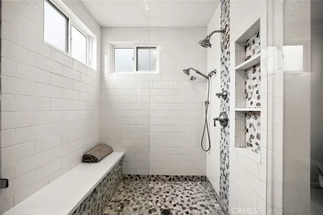 an aerial view of a house with a garden and trees