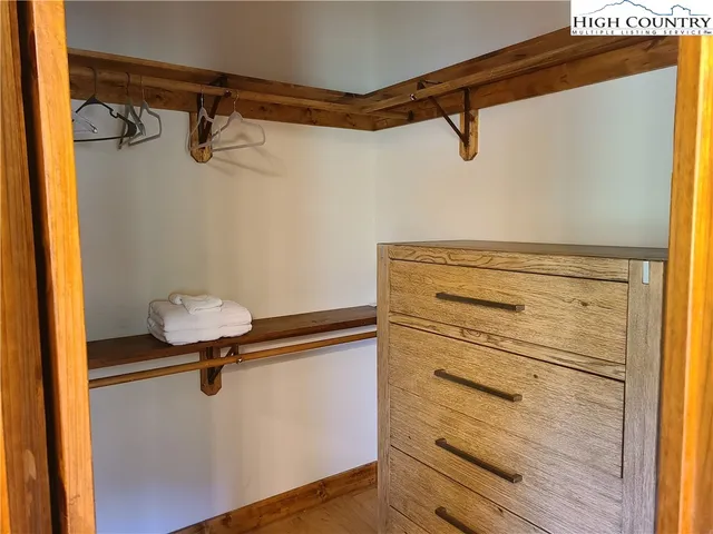 a view of a balcony with wooden floor