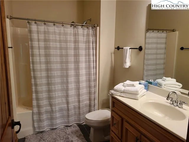 a view of hallway with a window