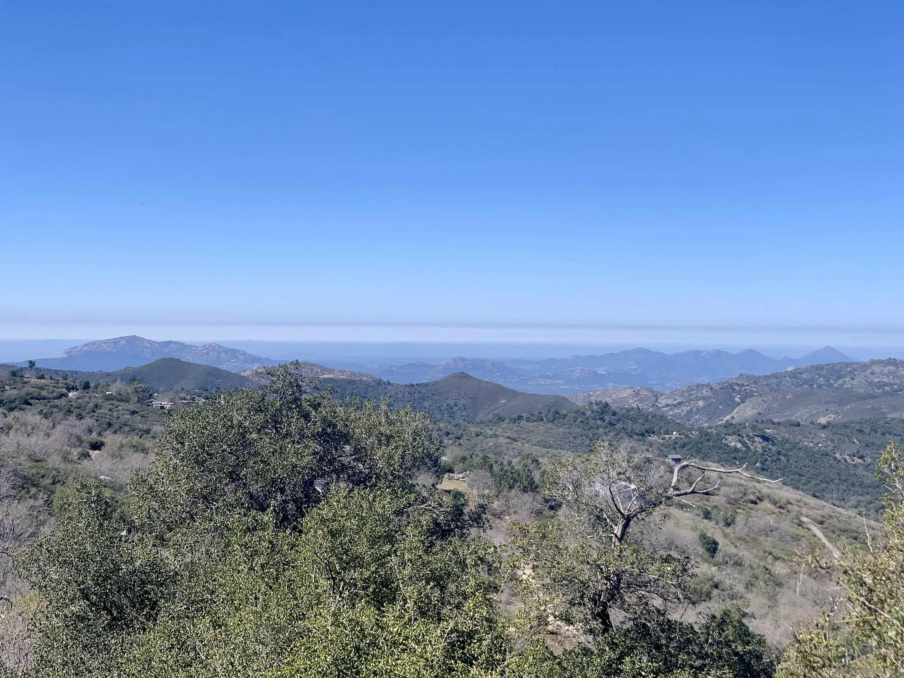 5253 Acorn Patch Road Julian, CA 92036 - Photo 9 of 18 an aerial view of mountain and trees