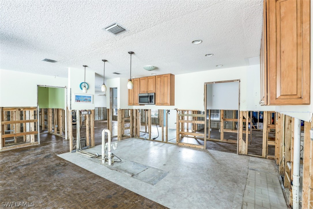 591 Boulder Drive Sanibel, FL 33957 - Photo 21 of 29 a view of a living room and entryway
