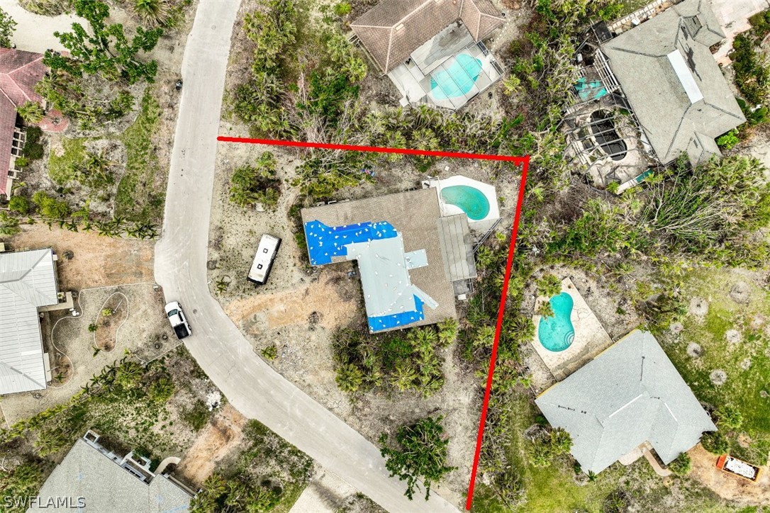 591 Boulder Drive Sanibel, FL 33957 - Photo 6 of 29 view of a house with outdoor space